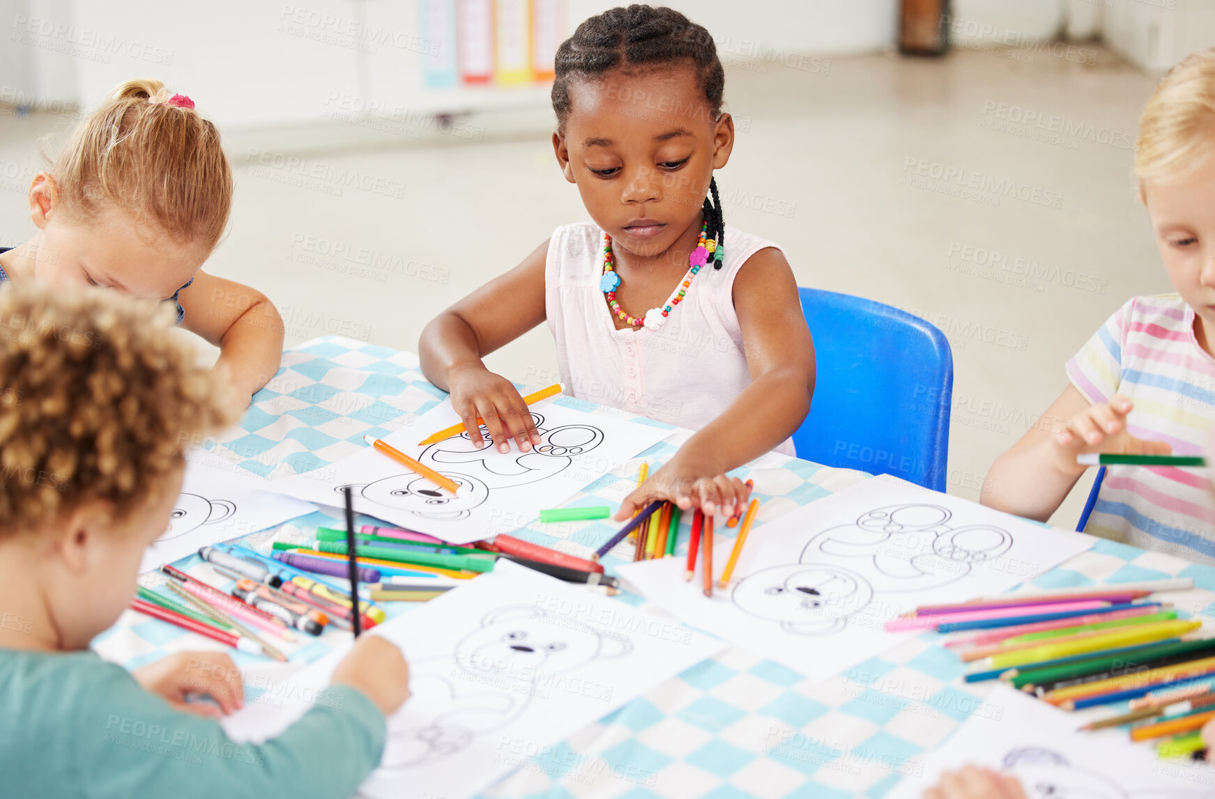 Buy stock photo Black kid, pencil and drawing for homework in classroom with creative, art or project for picture. Little girl, serious look and choice of color for learning, education or development of motor skills