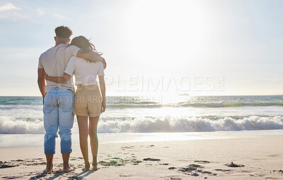 Buy stock photo Full length shot of an affectionate young couple at the beach