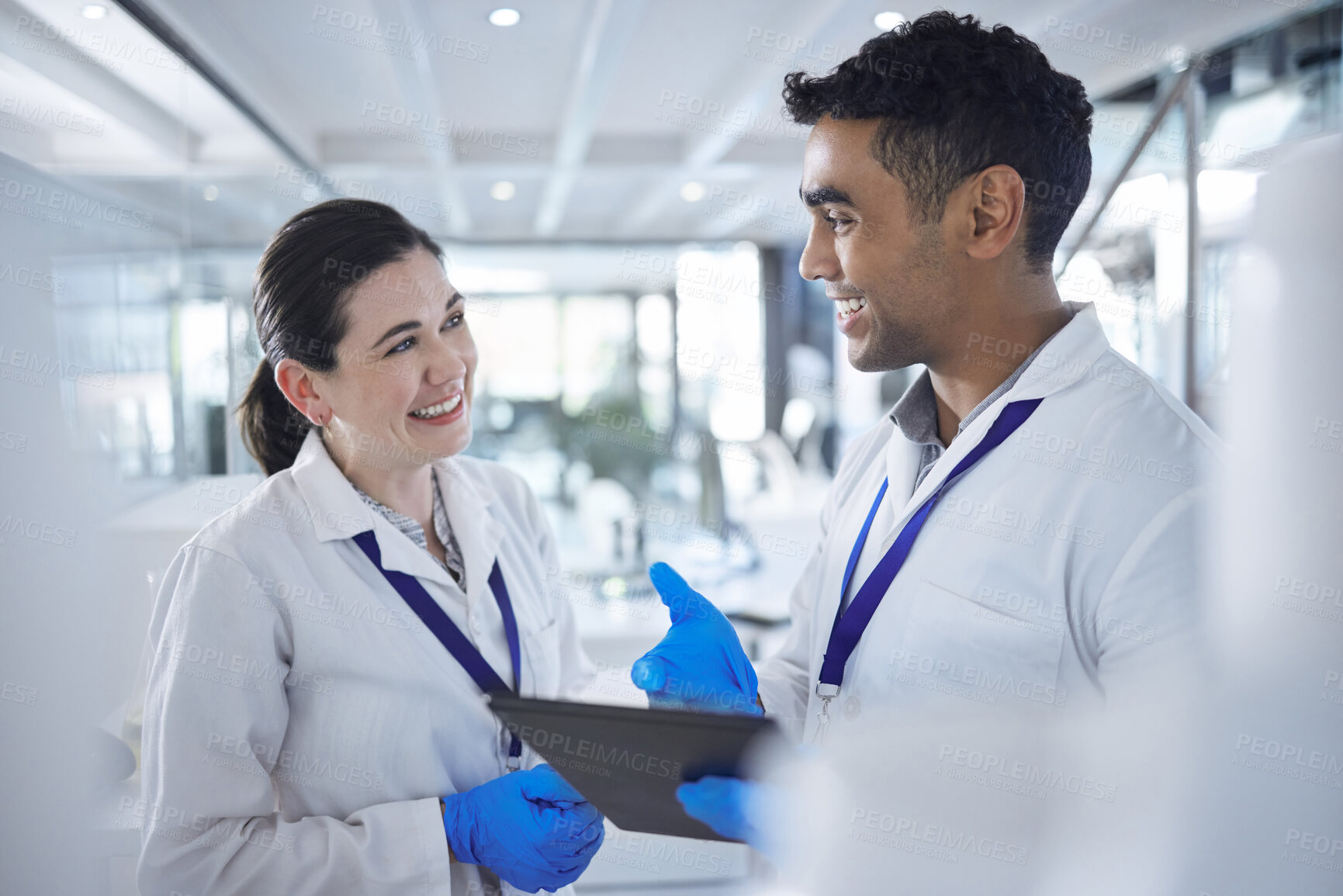 Buy stock photo Happy people, scientist and tablet in team research, collaboration or planning together at lab. Man and woman smile with technology for science discovery, search or teamwork at hospital or laboratory