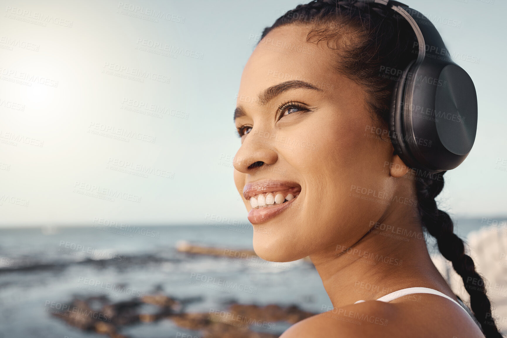 Buy stock photo Headphones, fitness and happy woman at beach for exercise, vision or running mindset, goals or music ideas. Health, podcast and athlete, runner or sports person thinking and listening to audio by sea
