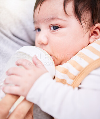 Buy stock photo Face, milk and a baby drinking from a bottle closeup with a parent for health, diet or nutrition. Food, formula or calcium and an adult feeding a hungry infant child for growth and development