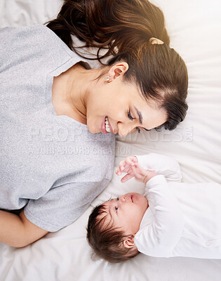 Buy stock photo Mother, baby and bed with love and care or security with smile or bond in comfort and peace. A woman or mom and infant child in a bedroom for safety in a family home for growth, above and connection