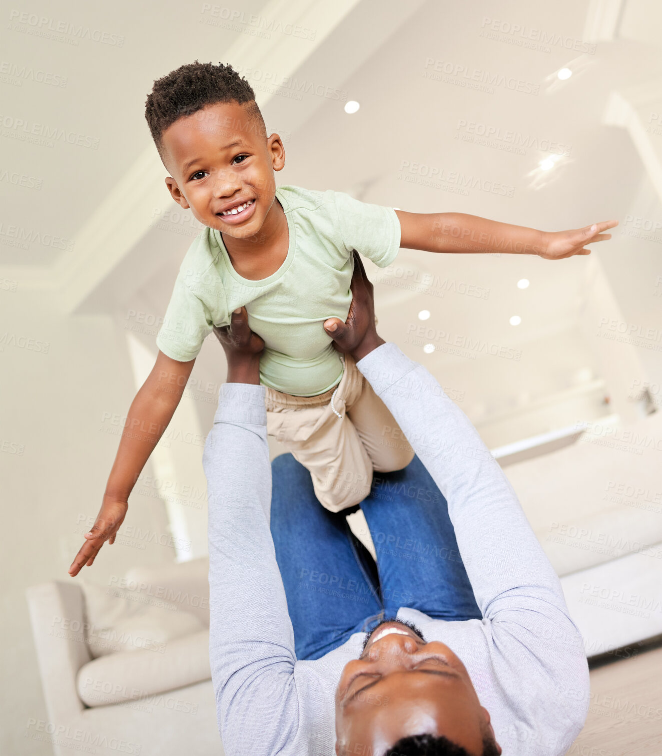 Buy stock photo Airplane, smile and portrait of child with father in the living room of modern house having fun. Happy, love and young African boy kid playing with his dad on the floor of the lounge at home together