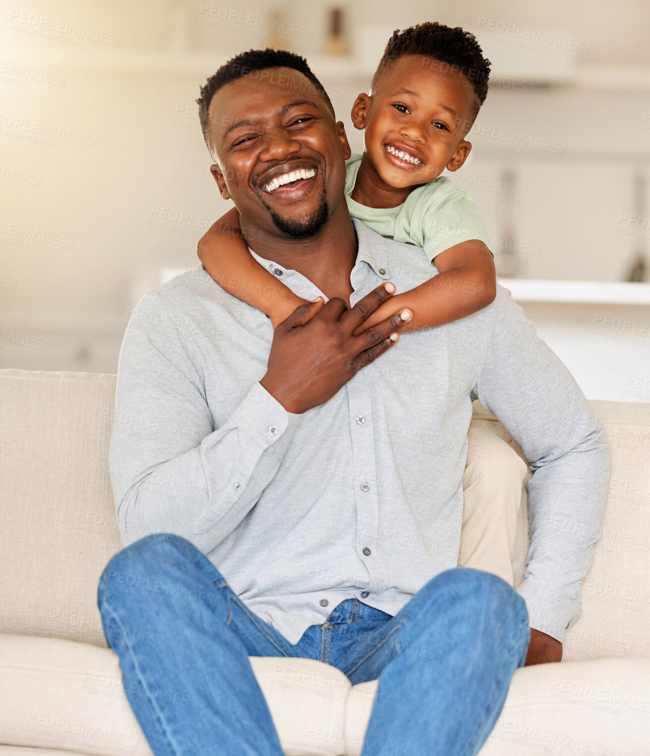 Buy stock photo Dad, son or hug on sofa in portrait, love or happy family with wellness in living room. Black people, man and child together with smile face, care bonding and weekend with gratitude support in house