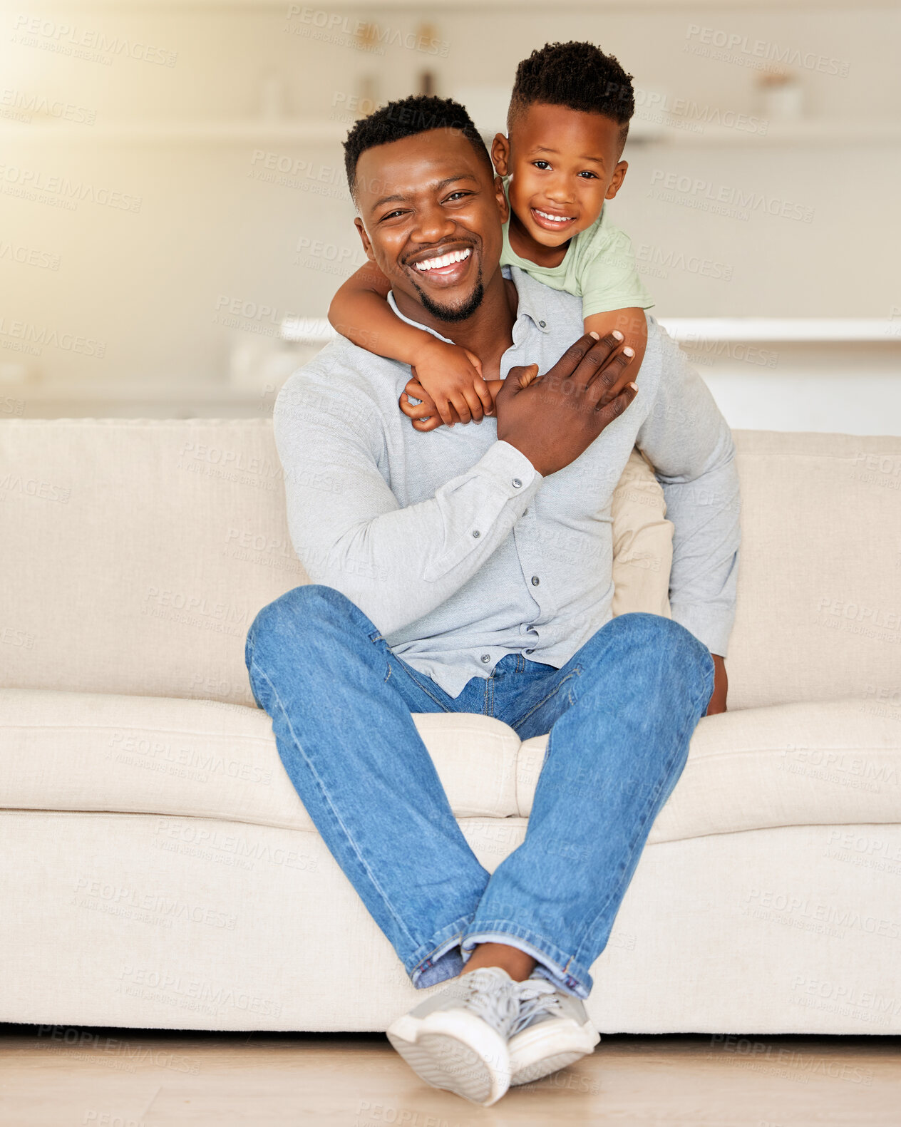 Buy stock photo Dad, son or embrace on sofa in portrait, love or happy family with wellness in living room. Black people, man and child together with smile face, care bonding and weekend with gratitude hug in house