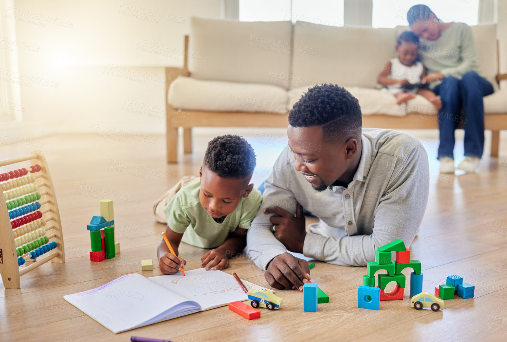 Buy stock photo Family, man and boy with book on floor, lying and living room with love, care and support for education. Father, son and together with toy, blocks or pen for child development, growth or learning