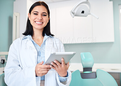 Buy stock photo Happy, tablet and portrait of woman dentist with confidence in her office doing research at clinic. Smile, medical and young female orthodontist or dental doctor with digital technology in hospital.