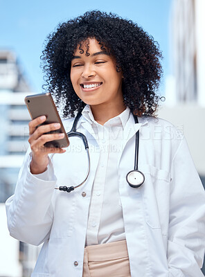 Buy stock photo Doctor, happy woman and phone for medical chat, social media and reading online information outdoor at hospital. African worker in healthcare with mobile for telehealth service, FAQ or clinic contact