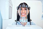 Happy caucasian woman getting a digital x-ray scan of her mouth at the dentist. One female only smiling for a dental checkup. Patient taking care of her oral hygiene to maintain healthy teeth and gums