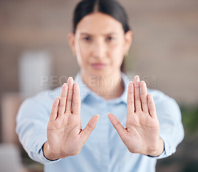 Closeup of female\'s hands showing stop. Business woman holding out her palms. Woman saying no to