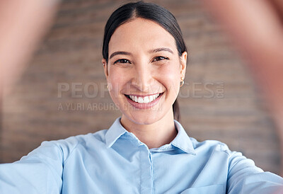 Buy stock photo Selfie, face and a business woman in her office to update her social media profile picture. Portrait, smile and a happy young employee posing for a photograph as a professional in the workplace