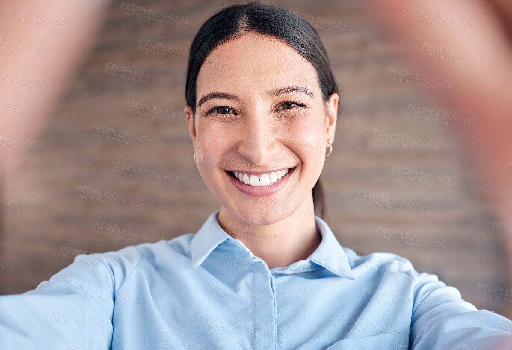 Buy stock photo Selfie, face and a business woman in her office to update her social media profile picture. Portrait, smile and a happy young employee posing for a photograph as a professional in the workplace