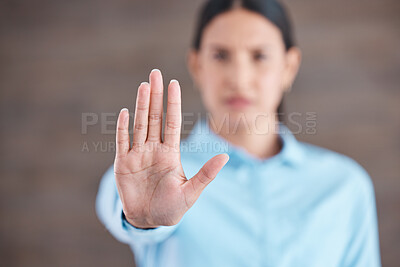 Buy stock photo Stop, hand sign and woman with no gesture for sexual harassment and violence in workplace. Business professional, palm and female employee at company with stopping emoji for gender rights at job