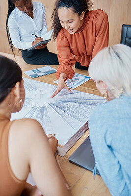 Buy stock photo Close up of a young mixed race woman giving a presentation to a group of female only colleagues at a boardroom meeting in a office. A team of diverse business women planning , brainstorming and strategizing 