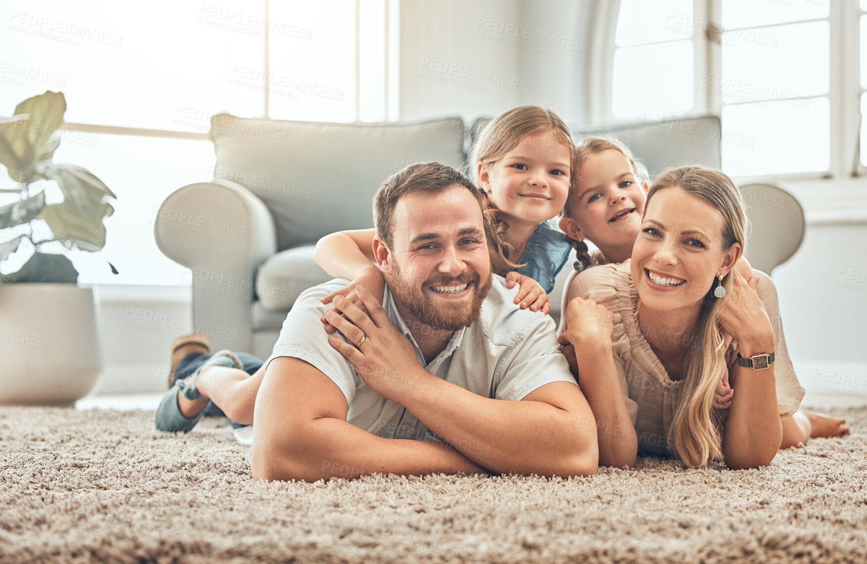 Buy stock photo Portrait of mother, father and children on living room floor for bonding, quality time and playing together. Happy family, smile and mom and dad with girls for care, love and relax at home on weekend