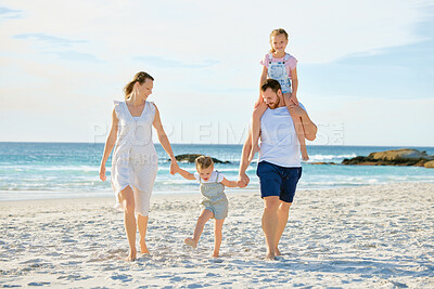 Buy stock photo Vacation, holding hands and travel with family at beach for summer, happy and bonding. Freedom, support and ocean with parents and children walking ion seaside holiday for love, care and happiness