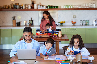 Buy stock photo Young dad working on laptop while kids draw and do homework. Father and two children working and drawing at table while mom is busy in kitchen during coronavirus pandemic