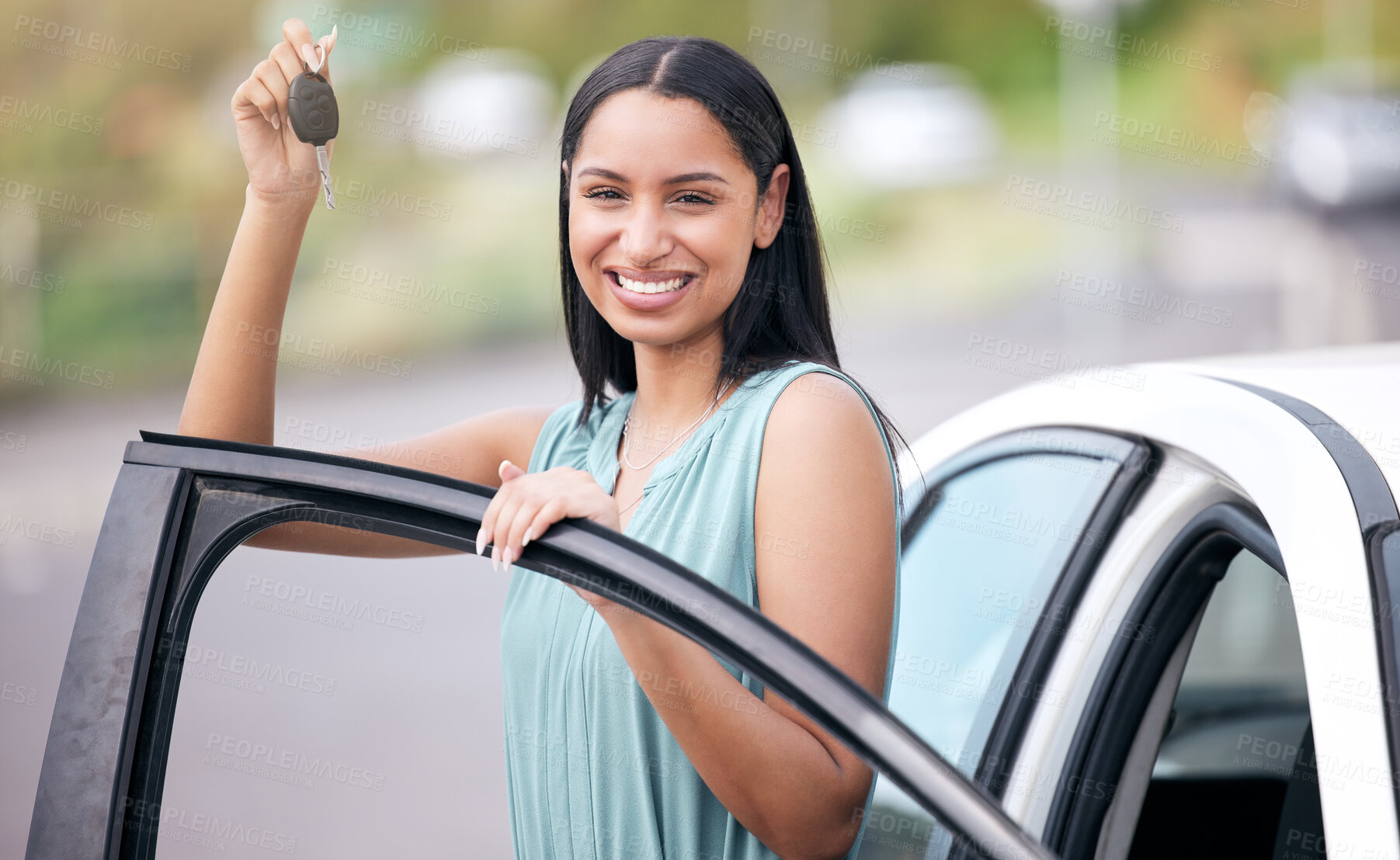 Buy stock photo Portrait of happy woman driver with new car, key and smile on face with loan, auto insurance and standing at door. Happiness, freedom to drive and customer with keys for motor vehicle in city street.