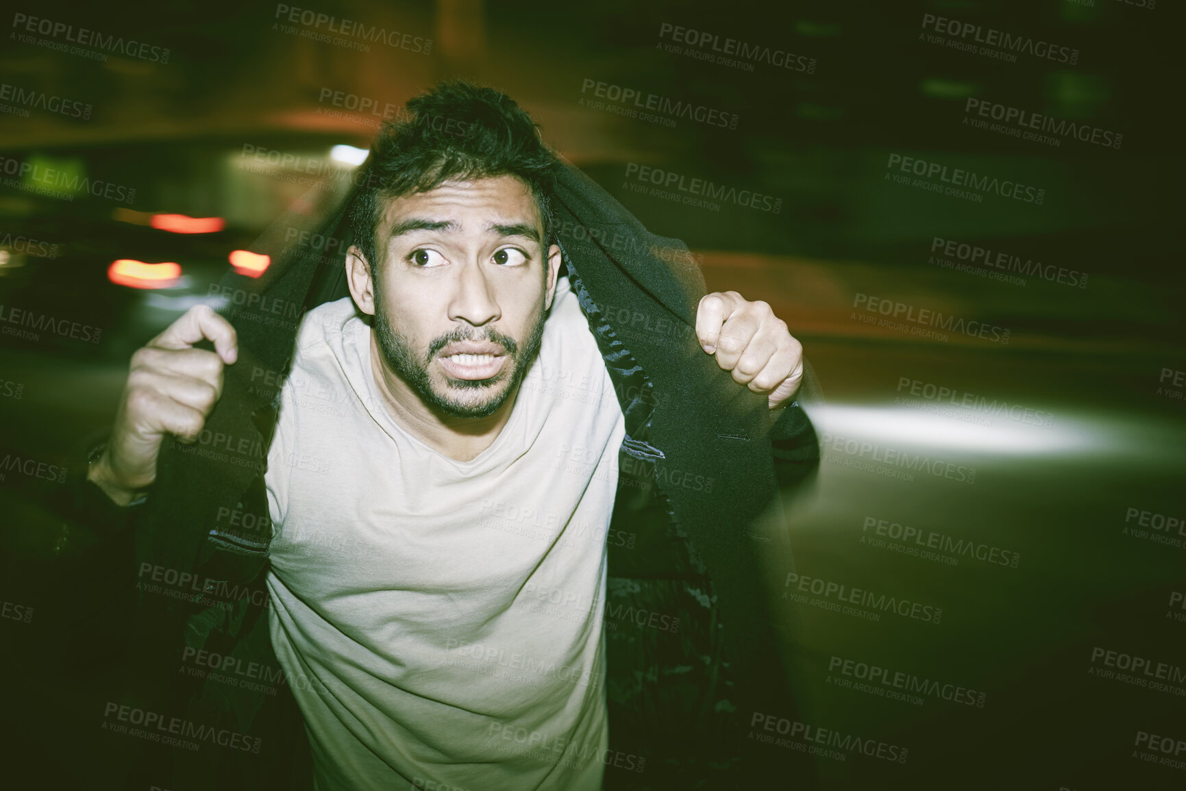 Buy stock photo Scared man with paranoid schizophrenia and bad mental health, illness or disorder. A young guy having a hallucination from drug abuse or mental disease, running in fear at night on the street
