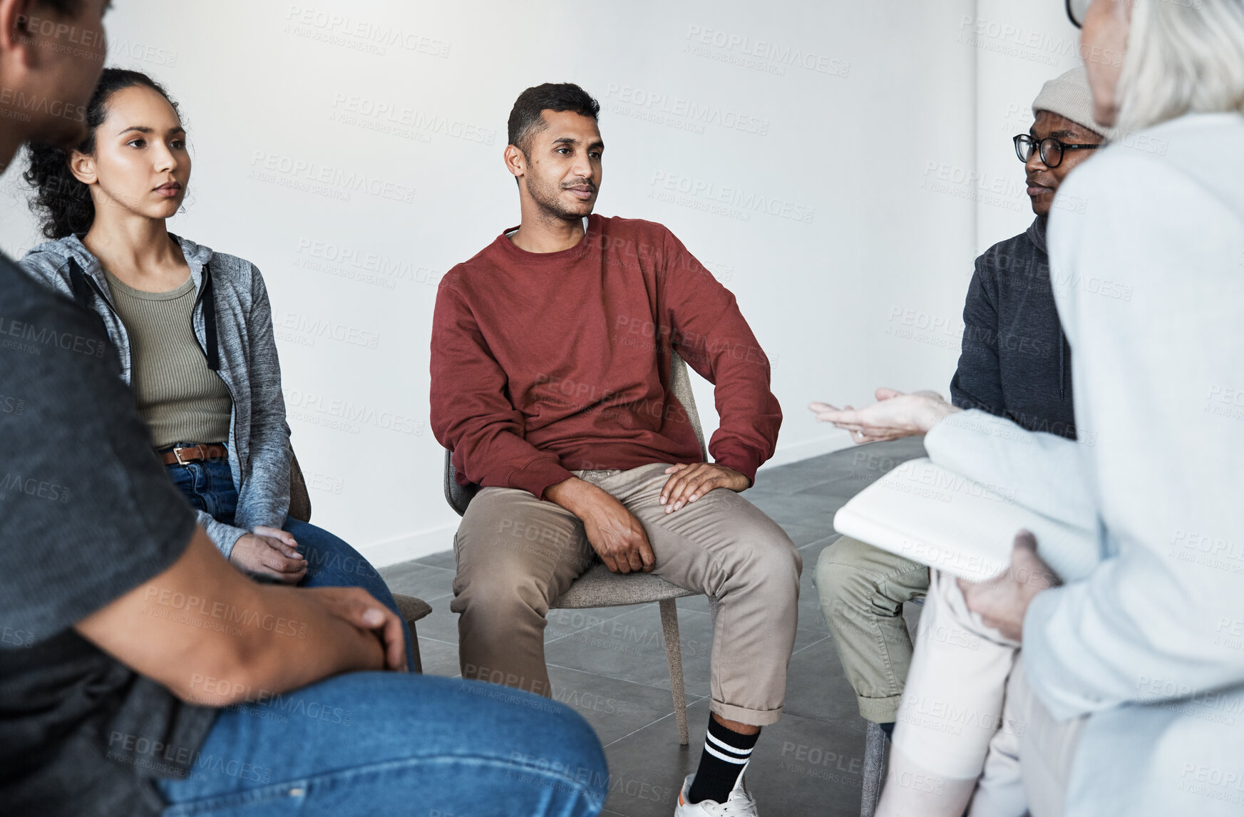 Buy stock photo Psychology, psychologist and group of people at a therapy session for mental health or depression. Community, diversity and patients or friends in a circle talking to a therapist at counseling center