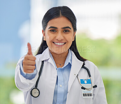 Buy stock photo Woman, doctor portrait and thumbs up with hospital success, motivation and yes in clinic. Emoji, winner and like hand sign of a professional healthcare and wellness worker feeling happy from job