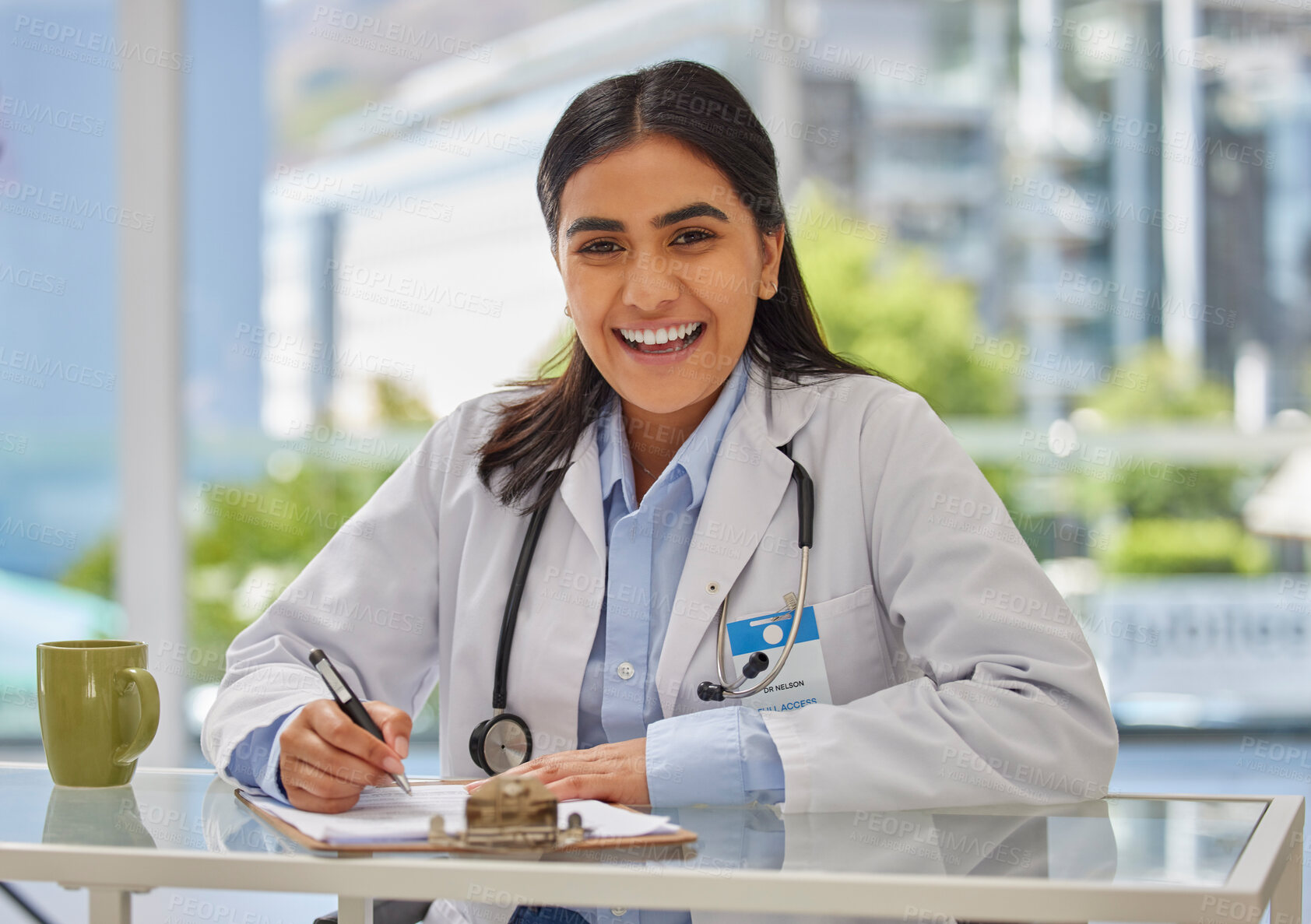 Buy stock photo Medical, happy and portrait of doctor in office for consulting, report and paperwork. Medicine, healthcare and checklist with woman writing in hospital for prescription, wellness exam and results