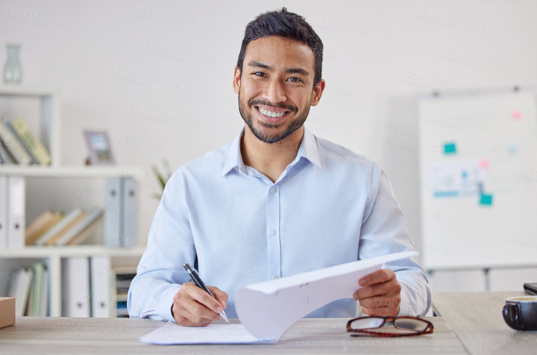 Buy stock photo Business man, paperwork and portrait in a office at startup and insurance management job. Company, professional and male employee with smile from contract, deal and corporate consultant work  at desk