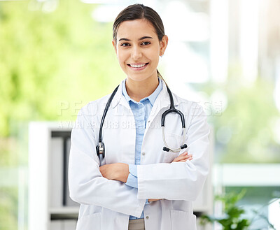 Buy stock photo Portrait, medical and arms crossed with a doctor woman in the hospital for insurance or treatment. Healthcare, happy or smile with a young female medicine professional standing alone in a clinic