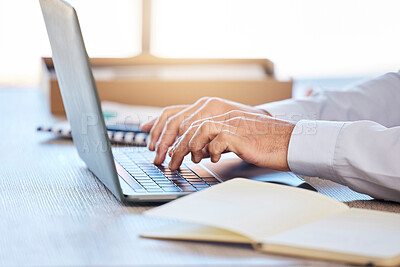 Buy stock photo Closeup of male hands typing on laptop keyboard. Businessman using laptop to type email or do online research while sitting at desk