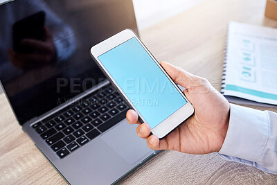 Buy stock photo Closeup businessman browsing the internet on a cellphone in an office. Mixed race professional standing alone and scrolling through schedule and social network. Connecting with clients on technology