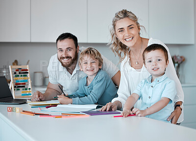 Buy stock photo Young happy caucasian family having fun together at home. Loving parents helping their little children with homework. Carefree siblings smiling while drawing with their mom and dad