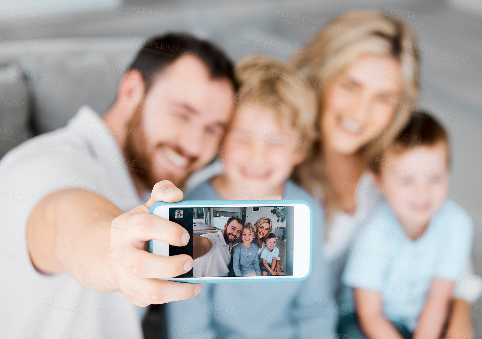 Buy stock photo Closeup of cellphone screen showing happy caucasian family taking selfies at home. Loving parents capturing photos and pictures for special childhood memories while bonding with carefree smiling sons