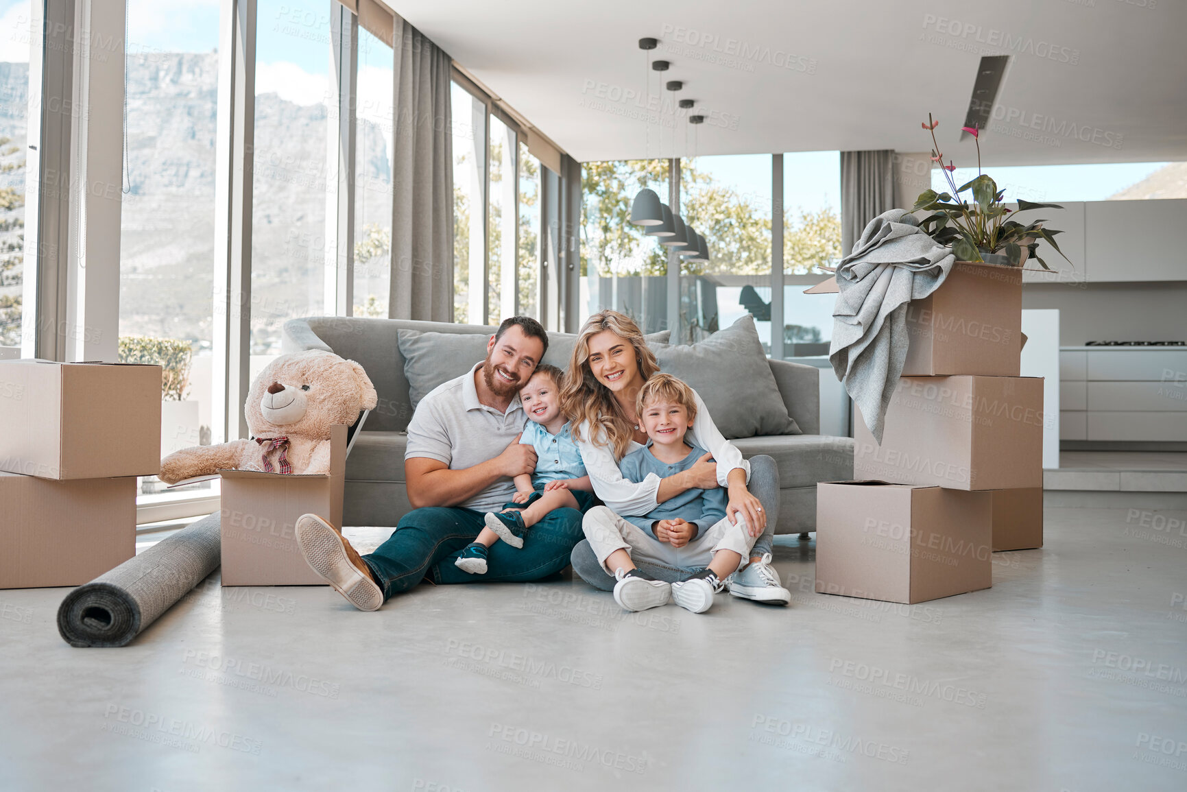 Buy stock photo Moving, box and portrait of family in new house for property, investment or future. Real estate, happy and renting with parents and children in living room of home for relocation, homeowner and relax