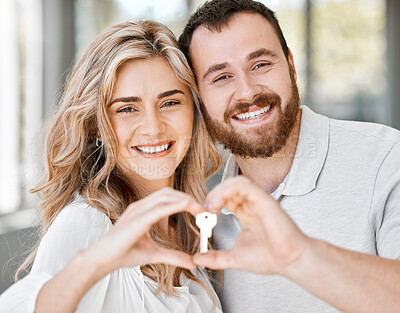 Buy stock photo New home, couple and hand heart with key for moving, love and mortgage celebration portrait. Happiness, emoji and excited hands sign with house and real estate keys together with property support