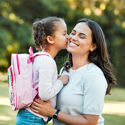 Buy stock photo Adorable little girl kissing her mother on the cheek outside. Cute mixed race child saying goodbye to parent outside before going into school. Beautiful woman showing love and affection from daughter