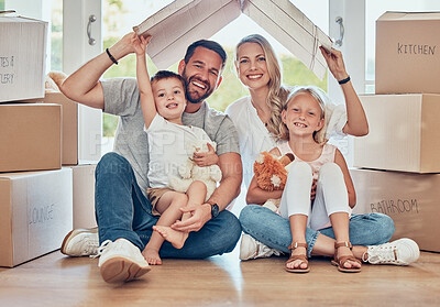Buy stock photo Portrait of happy family, new home and cardboard roof for insurance, safety and future investment in real estate. Moving, boxes and happiness, mom and dad with kids in house with property mortgage.