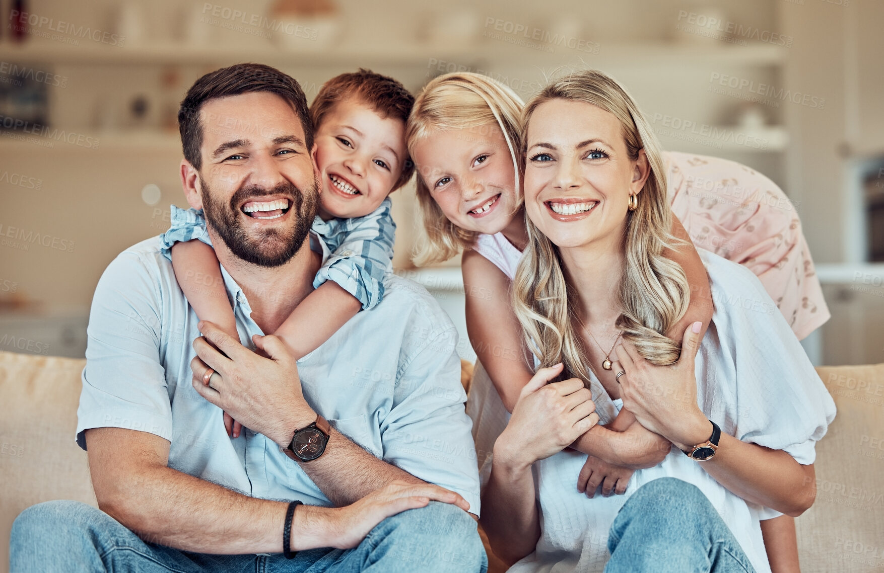 Buy stock photo Portrait of parents, kids and smile on sofa for playful childhood, happiness and quality time in family home. Happy children, mother and father hug in living room for bonding, love and care together