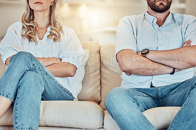Buy stock photo Couple, arms crossed and argument on sofa, home and breakup in divorce, anger and problems. Closeup of angry man, woman and ignoring partner in fight, conflict and frustrated for relationship crisis 