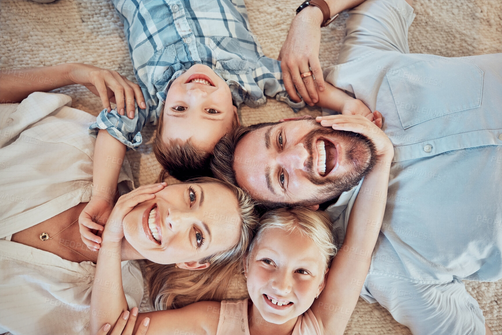 Buy stock photo Top view, parents and happy portrait of children for love, care and bonding for quality time together at home. Face of mom, dad and kids for happiness, family and relax in house for fun, joy and play