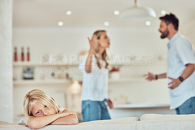 Buy stock photo Portrait of sad little girl, parents fighting in the background. Depressed child, parents arguing at home. Couple in conflict around their daughter. Stressed caucasian girl parents divorcing