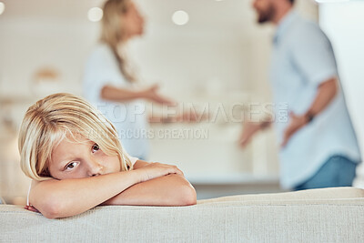 Buy stock photo Portrait of sad little girl, parents fighting in the background. Depressed child, parents arguing at home. Couple in conflict around their daughter. Stressed caucasian girl parents divorcing