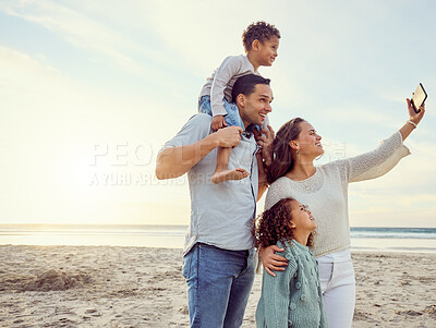 Buy stock photo Happy, family and beach selfie at sunset, bonding and having fun on sea vacation mockup. Photograph, ocean and mother, father and kids taking profile picture for social media, smile and summer memory