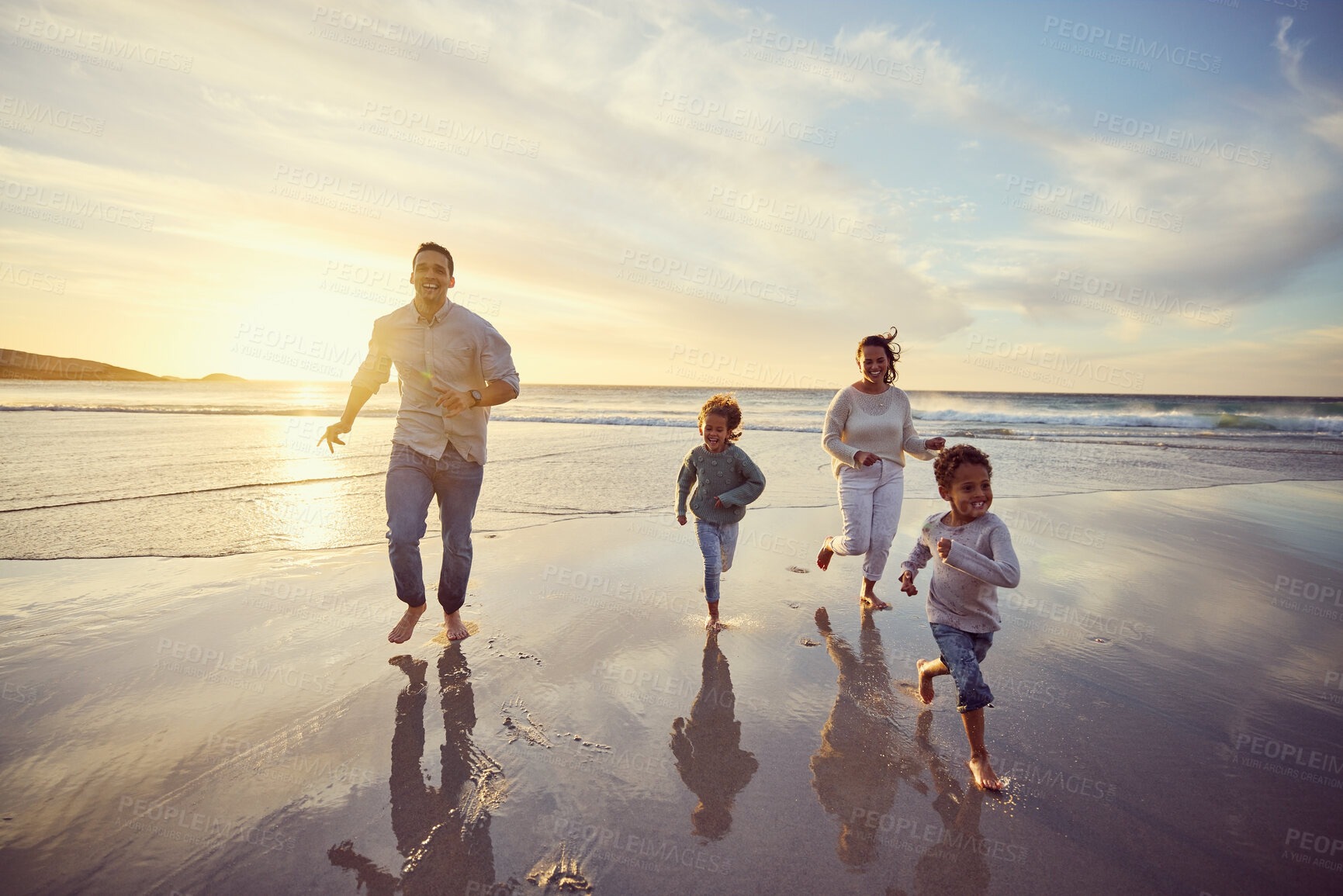 Buy stock photo Beach, running and parents play with children on holiday, summer vacation and weekend together. Nature, travel and happy mother, father and children in ocean for bonding, adventure and family time