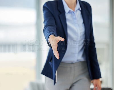Closeup of caucasian business woman extending hand forward to greet welcome with handshake. Networking and meeting to agree on deal or offer. Consulting and collaborating on negotiation for job hiring