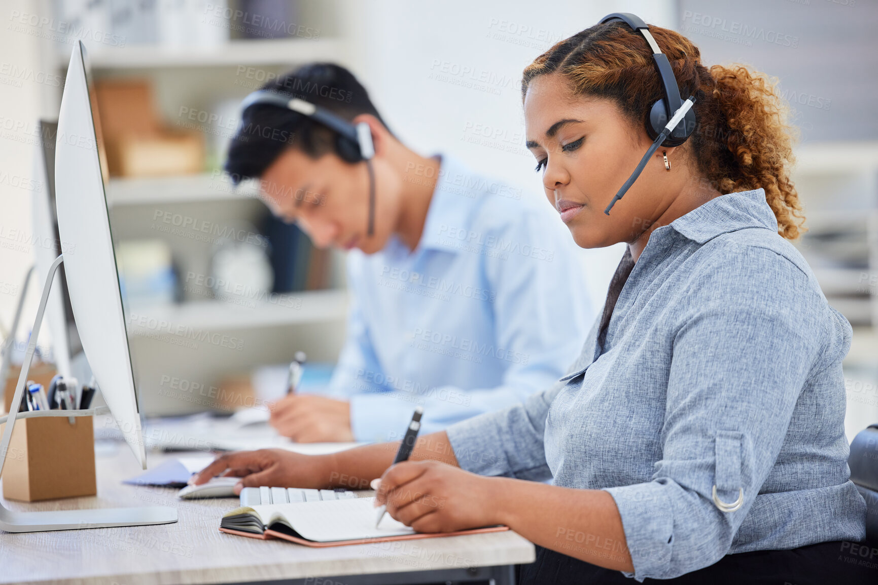 Buy stock photo Telemarketing, business woman writing and contact us help in a office with notes at desk. Call center, African female employee and consulting of a worker with web phone support and agent advice