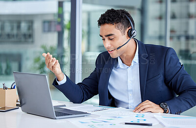 One young mixed race call centre agent talking on a headset while reading document notes and using laptop for video call in an office. Hispanic salesman and marketing rep consultant advising while operating helpdesk for customer service support