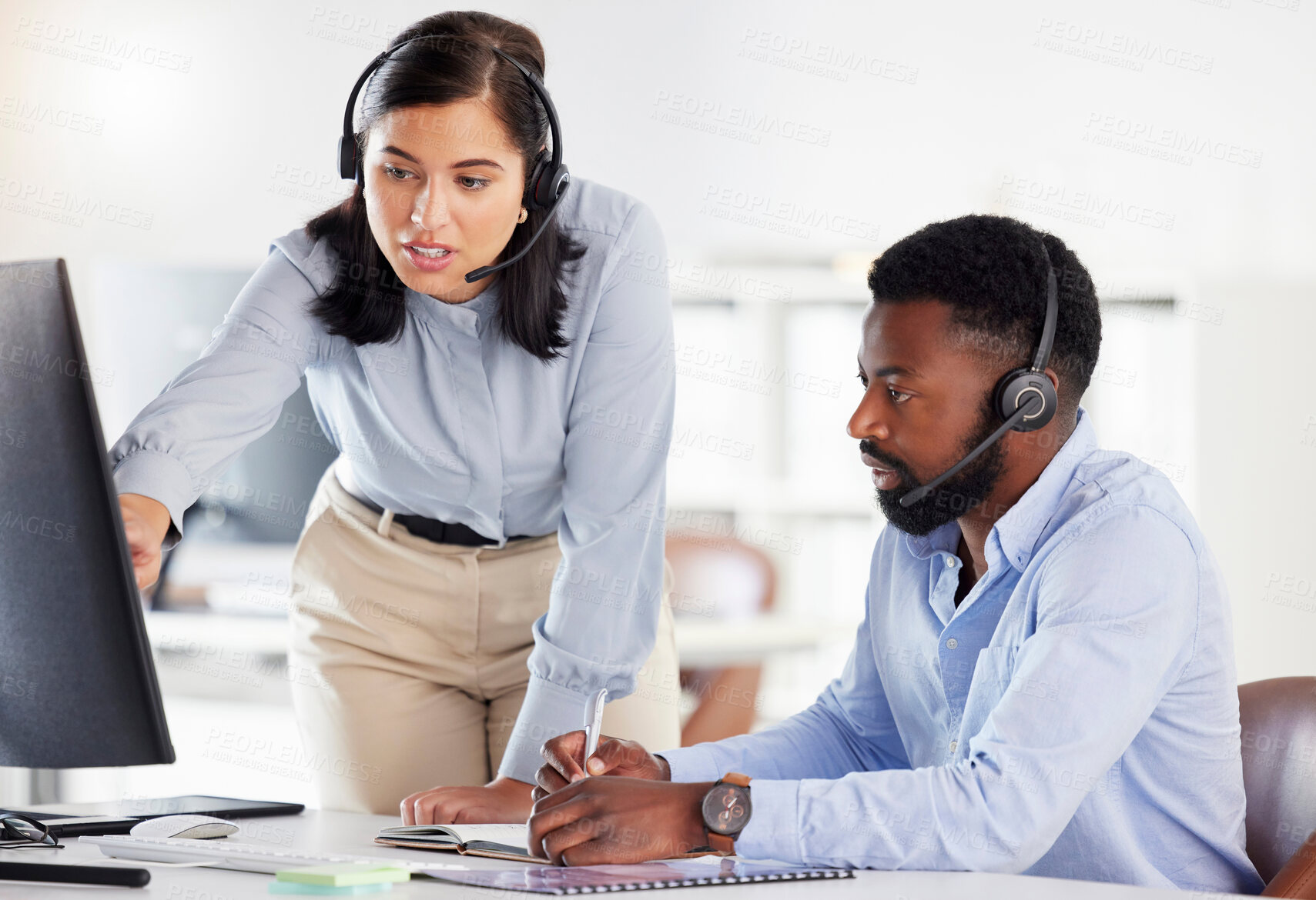 Buy stock photo Call center, manager helping agent and training with mentor, telemarketing and customer service. Staff, black man and woman with computer, advice for system and tech support with conversation and crm