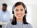 Portrait of one happy smiling caucasian call centre telemarketing agent talking on headset in office. Face of confident and friendly businesswoman operating helpdesk for customer service and sales support