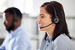 One happy smiling caucasian call centre telemarketing agent talking on headset in office. Face of confident and friendly businesswoman operating helpdesk for customer service and sales support