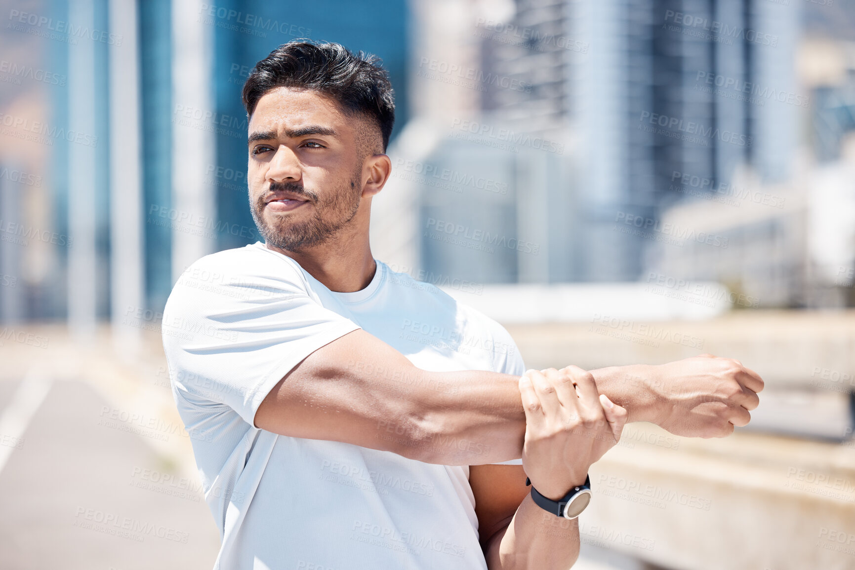 Buy stock photo Man, fitness and stretching arms in city for running, cardio workout or exercise in the outdoors. Fit, active or sporty male person, athlete or runner in warm up arm stretch before training in town